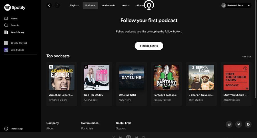 Spotify
			 content recommendation content discovery dark theme navigation bar ui page example